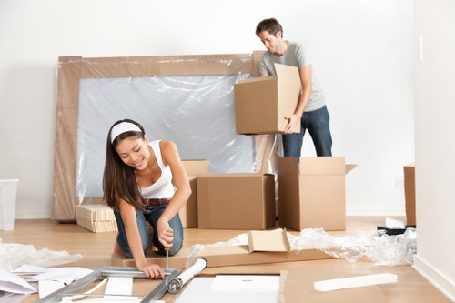 Loading business items into storage near Millbank