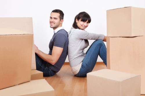 Professional office removals team coordinating a Millbank business move