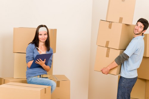 Professional movers loading items for a central London relocation